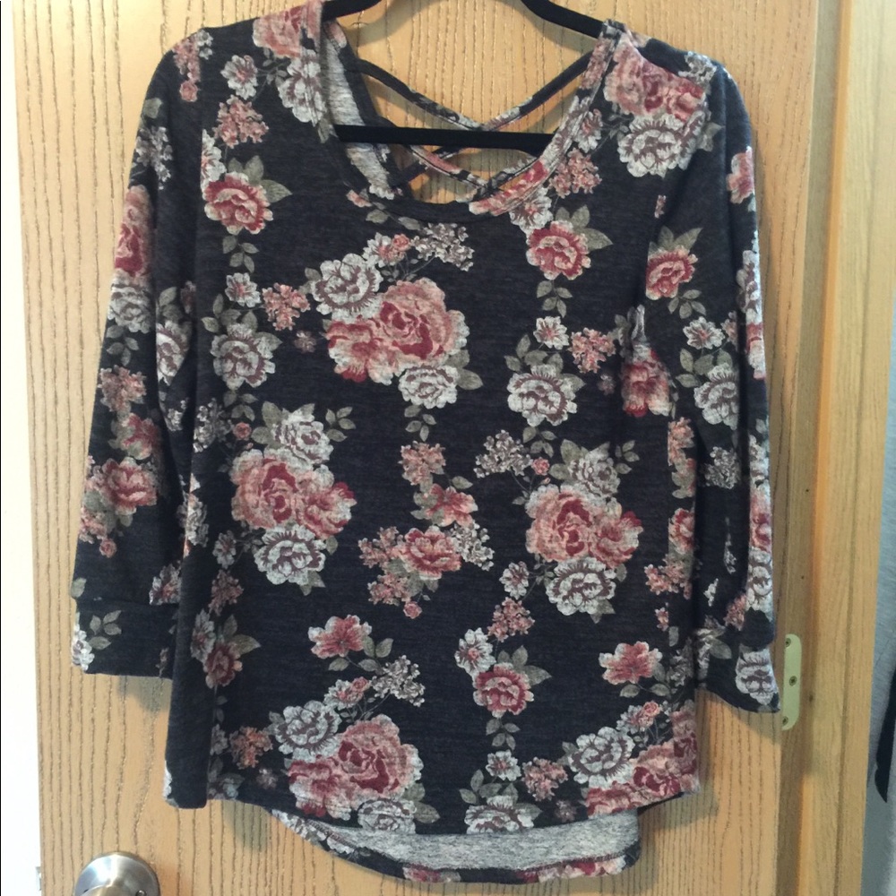Floral print sweater with crisscross back.